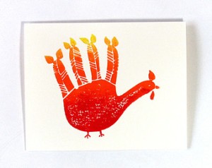 http://www.etsy.com/uk/listing/165435599/hand-turkey-menorah-for-thanksgivukkah?ref=market